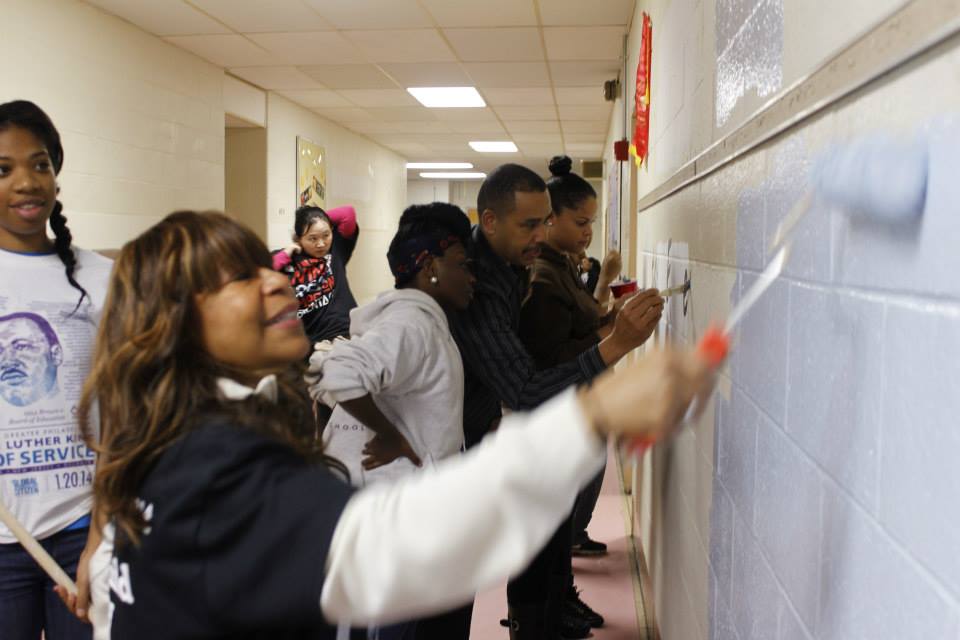 Morton's Principal Dr. Carolyn Allen-Glass rolls out some new paint.